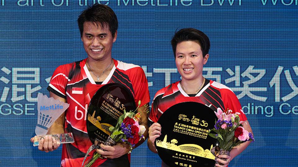 Ganda campuran Indonesia, Tontowi/Liliyana saat meraih juara China Open Super Series 2016. - INDOSPORT